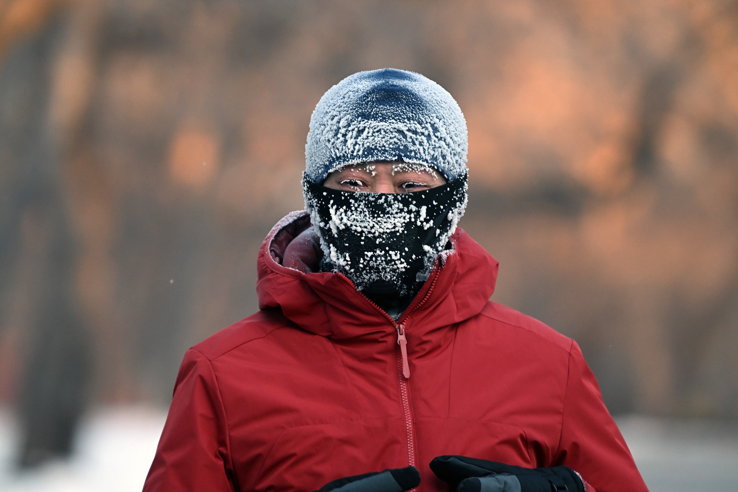 SHENYANG, CHINA - JANUARY 22, 2026 - A citizen who runs in the park in extremely cold weather forms white frost on his cheeks and eyelashes in Shenyang, Liaoning Province, China on January 22, 2026. (Photo credit should read CFOTO/Future Publishing via Getty Images)