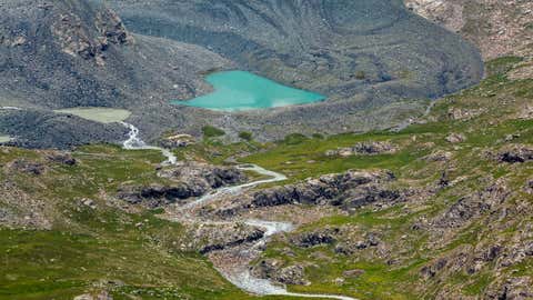 A majestic heart-shaped mountain lake is seen in Tien Shan mountains, Kyrgyzstan. (Evgeny_D/Getty Images)