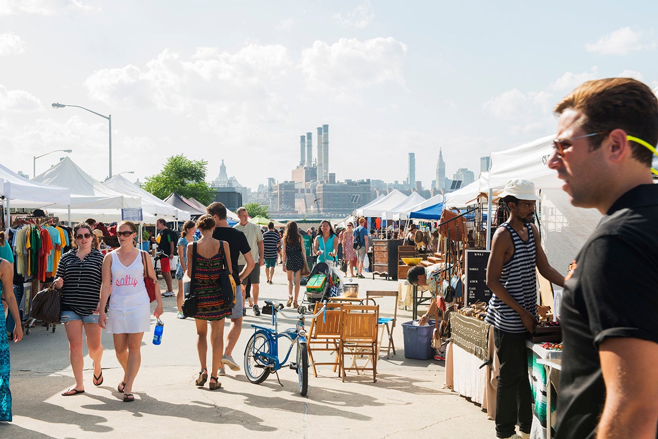 People crowd the Brooklyn Flea Market in New York City on a summer afternoon. (Getty Images)