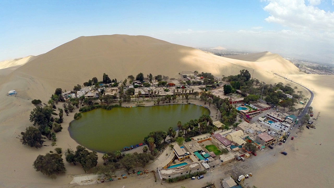 Aerial  view of the Huacachina Oasis in Ica, Peru, some 186 miles south of Lima on December 11, 2014, one of Ica's main attractions.  (Martin Bernetti/AFP/Getty Images)                                                                                                           