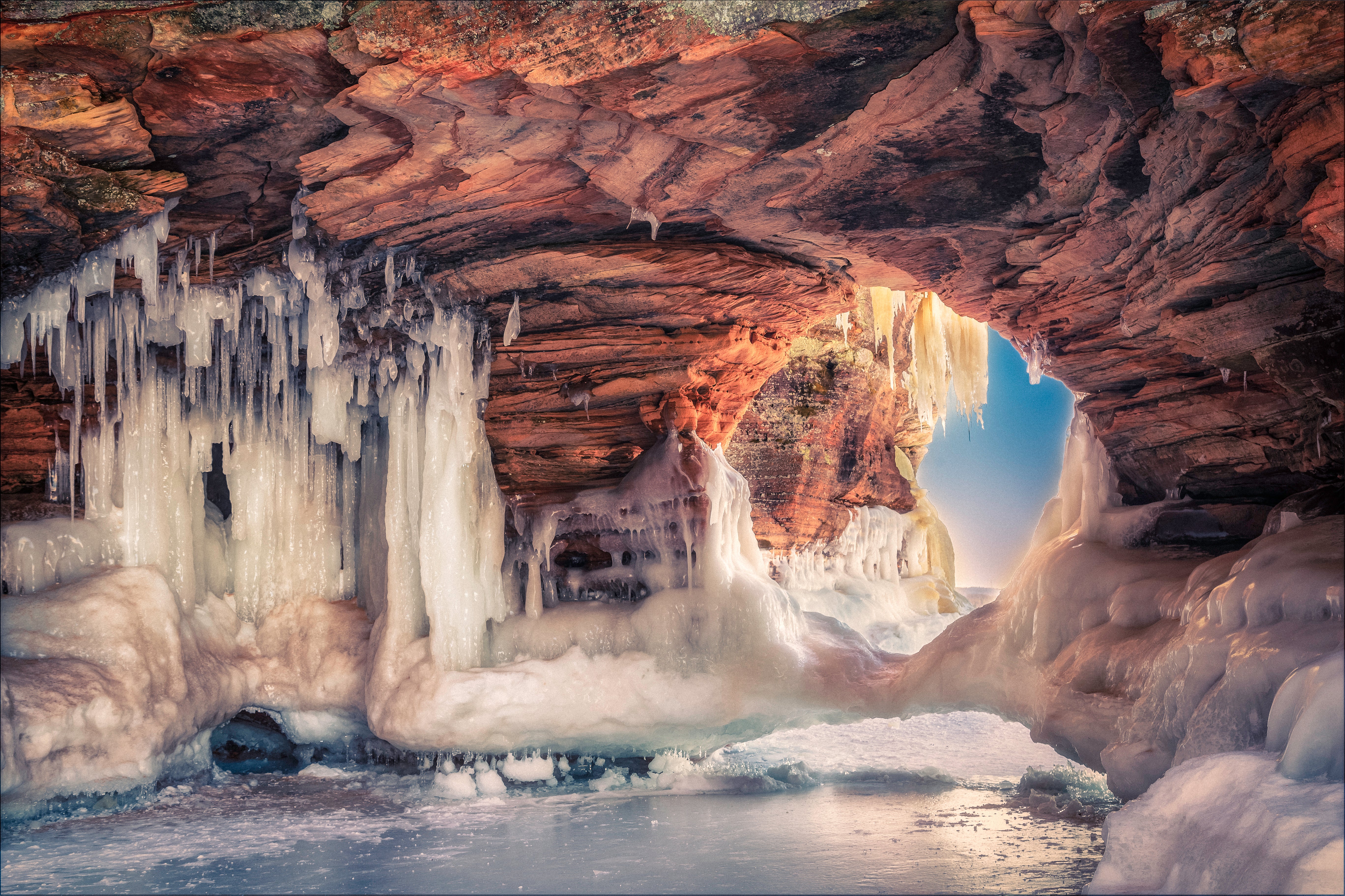 The sea caves along Apostle Islands National Lakeshore freeze into gorgeous ice caves and are accessible when Lake Superior&rsquo;s shoreline freezes. (Getty Images)