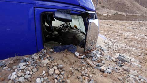 Tehachapi, CA - October 16, 2015: Nearly 200 vehicles, including 75 tractor-trailers, are trapped on California 58 east of Tehachapi in up to 20 feet of mud and debris after torrential rains pummeled the area and forced drivers to flee. (Francine Orr/ Los Angeles Times)