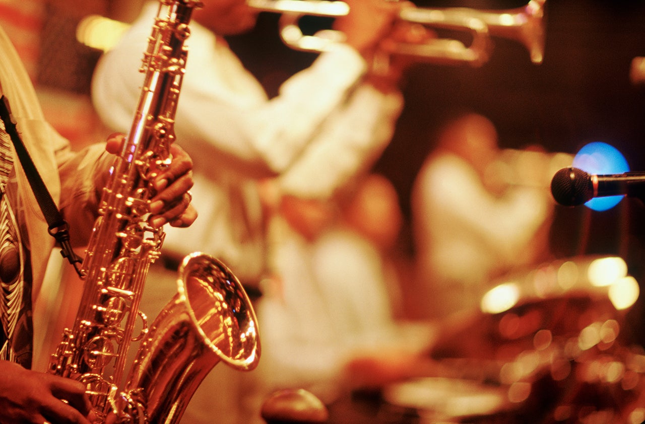 See New Orleans by paddle-wheel riverboat while listening to live jazz and enjoying a Creole-style dinner on the Steamboat Natchez Evening Jazz Cruise. (DiMaggio/Kalish via Getty Images)