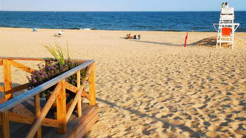 The deck of the public pavilion at Main Beach in East Hampton, Long Island. the beach is nearly deserted in the late afternoon