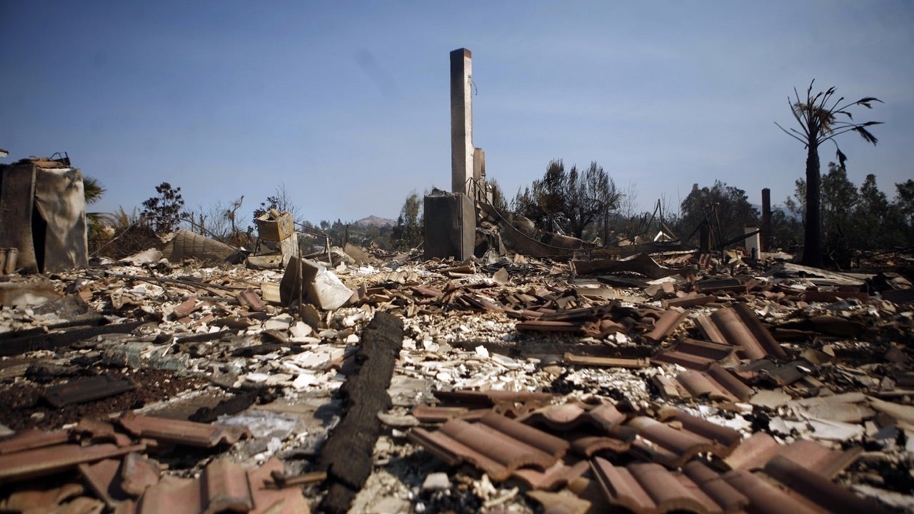 SAN DIEGO- OCTOBER 24:  A chimney still stands among the ruins of a fire ravaged home in the Rancho Bernardo neighborhood October 24, 2007 in San Diego, California. Southern California is being ravaged by numerous record wildfires as Santa Ana Wind conditions push them into communities surrounded by native Chaparral habitat that has been dried by the driest rain season since records began 130 years ago. The fires are shaping up to be the worst wildfire event in San Diego County history. As many as 500,000 people have been evacuated from their homes.   (Photo by Eric Thayer/Getty Images)