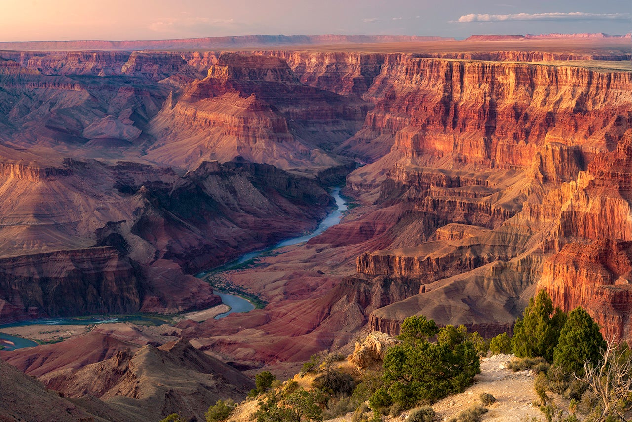 The Grand Canyon and Colorado River are seen at sunset. (Dean Fikar via Getty Images)