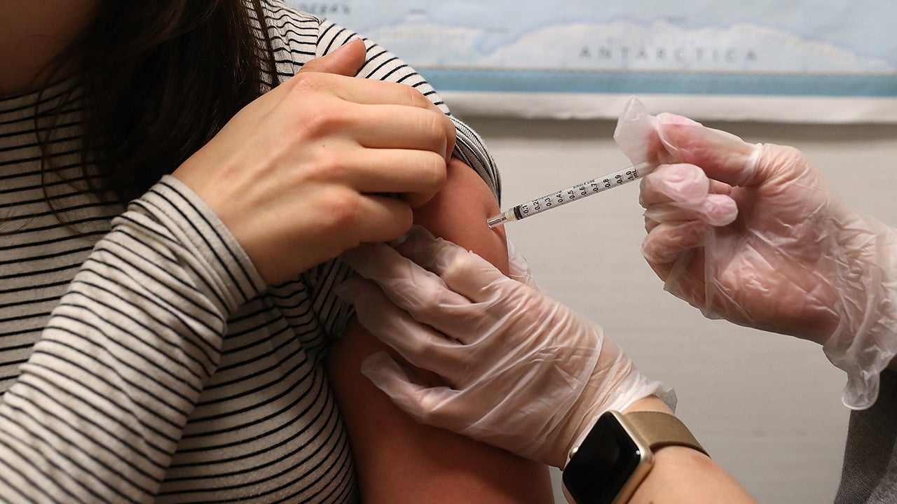 A patient receives a flu shot in San Francisco, California, earlier this year. The FDA has approved a new antiviral treatment, Xofluza, for some people who get the flu. (Photo by Justin Sullivan/Getty Images)