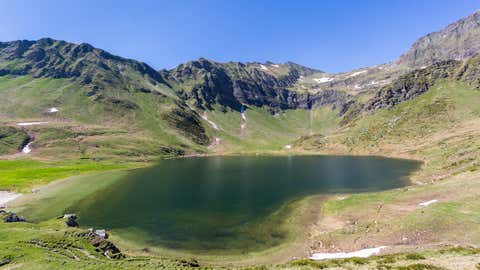 View of the Lago di Tom in the Piora Valley, in the canton of Ticino, Switzerland. (Phalder/iStock via Getty Images)