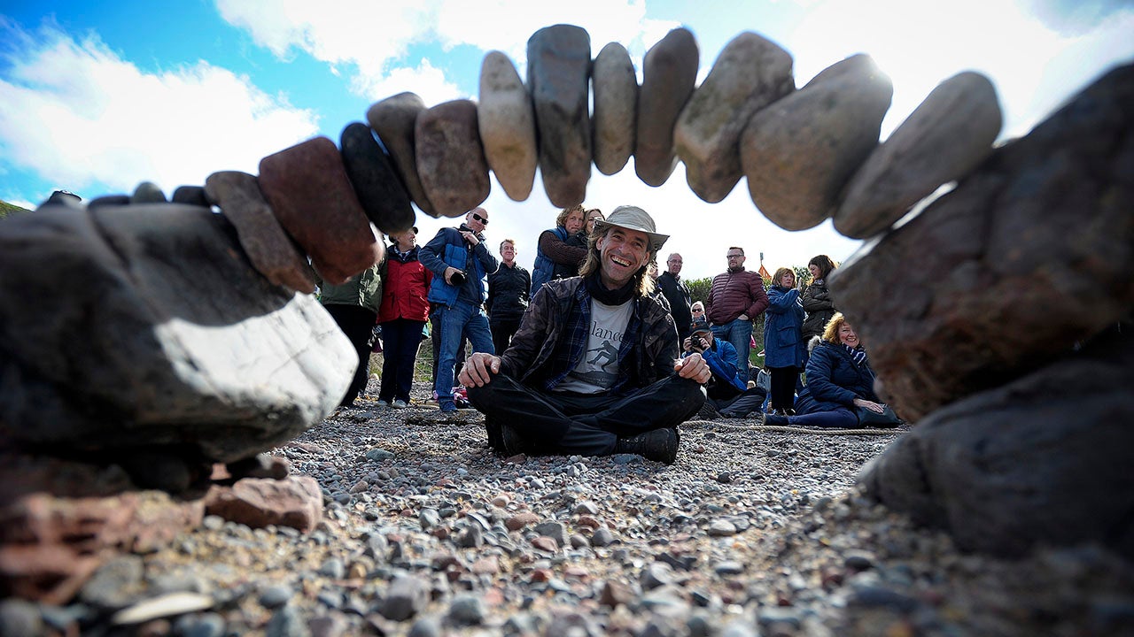 Overall winner, Pedro Duran from Spain, competes in the European Stone Stacking Championships 2018 in Dunbar, Scotland, on April 22, 2018. The European Stone Stacking Championships are Europes largest championships for all Stone Stacking and Rock Balancing artists and practitioners. The overall winner of the European Stone Stacking Championship will receive financial support for flights to the World Stone Balance Championship in Llano, Texas the following year. (ANDY BUCHANAN/AFP/Getty Images)