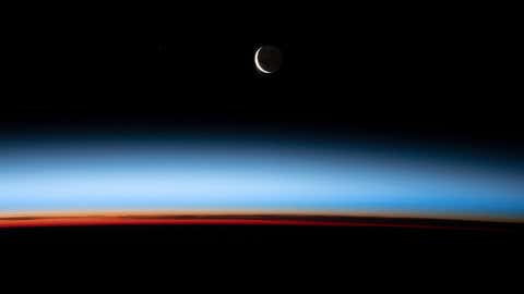 A waxing crescent Moon pictured from the ISS during an orbital sunset as it flew above the Pacific Ocean. (Astronaut photograph ISS066-E-86969 / NASA)