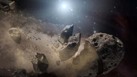 This artist's concept shows a broken-up asteroid.