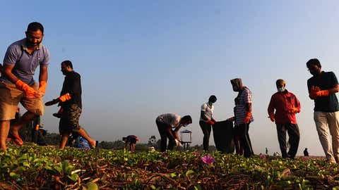 Eco-warriors on a Puducherry Beach Clean-up Drive. (IANS)