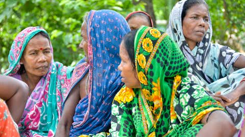 Women are part of the forest management committees formed under the FRA. Seen here are women from a village in Odisha discussing the various MFP collected and its uses. (Akoijam Sunita / Oxfam India)