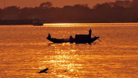 The Hooghly river bathed in golden light. The 260-km Hooghly is an arm of the Ganga, and empties into the Bay of Bengal. The British East India Company sailed up this river set up Calcutta (now Kolkata), a colonial city, which served as British India’s capital from 1772 to 1911.  
Photo: Subhrajit Chandra/ EISAMAY, BCCL, Kolkata