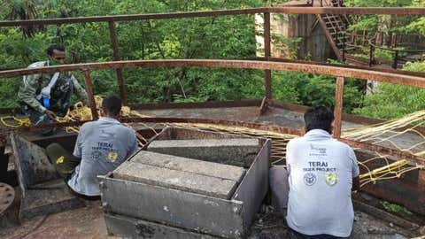 Rescue work around the tank. (WTI)