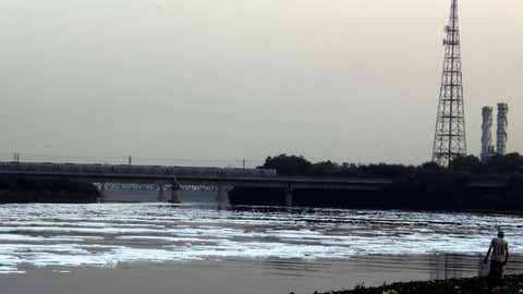 Large amounts of white, toxic foam over the Yamuna river, as seen in New Delhi on Oct 21, 2020. (IANS)