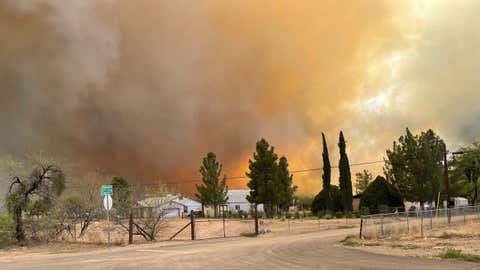 Smoke from the Margo Fire in Dudleyville, Arizona, turned the sky orange on Thursday, April 8, 2021. (Pinal County Sheriff's Office via Twitter)