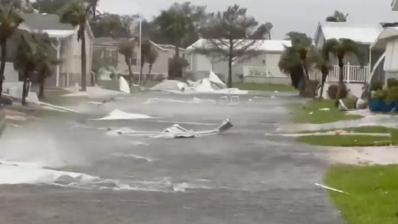 Watch: Twisted Debris Flies Through Neighborhood - Videos from The