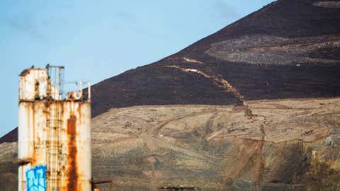 A crack in Rattlesnake Ridge is seen extending from a gravel pit up and across the ridge near Union Gap, Washington. (Shawn Gust/Yakima Herald-Republic via AP)