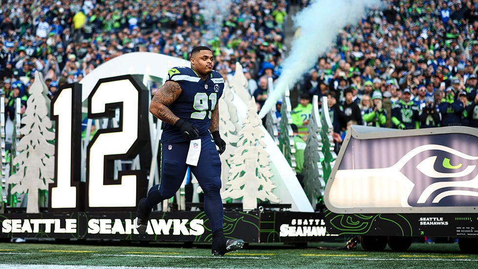 SEATTLE, WASHINGTON - JANUARY 25: Byron Murphy II #91 of the Seattle Seahawks runs onto the field prior to the NFC Championship NFL football game against the Los Angeles Rams at Lumen Field on January 25, 2026 in Seattle, Washington. (Photo by Kevin Sabitus/Getty Images)
