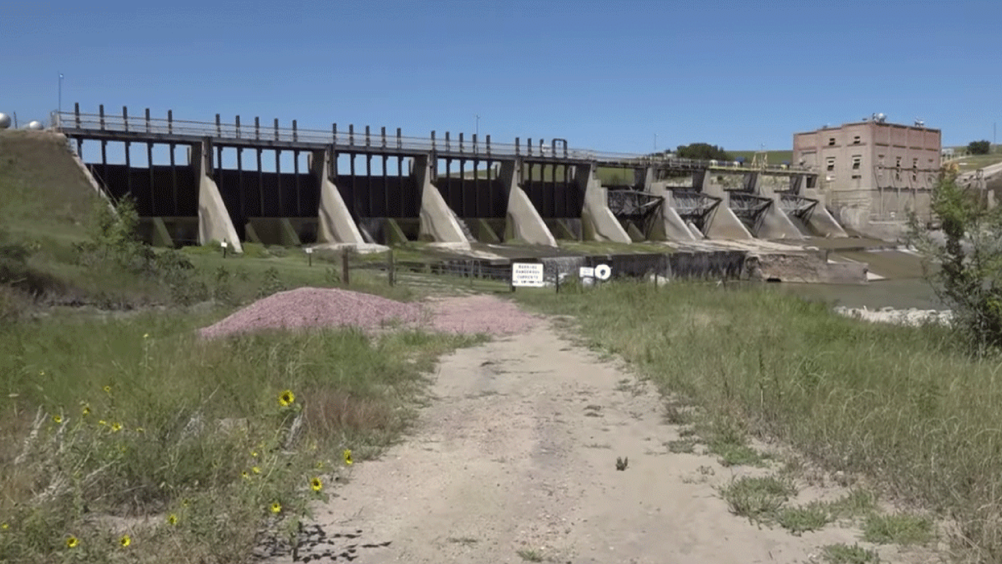 Photos of Spencer Dam, along the Nebraska-South Dakota border, before and after the dam was destroyed by flooding in March 2019. 