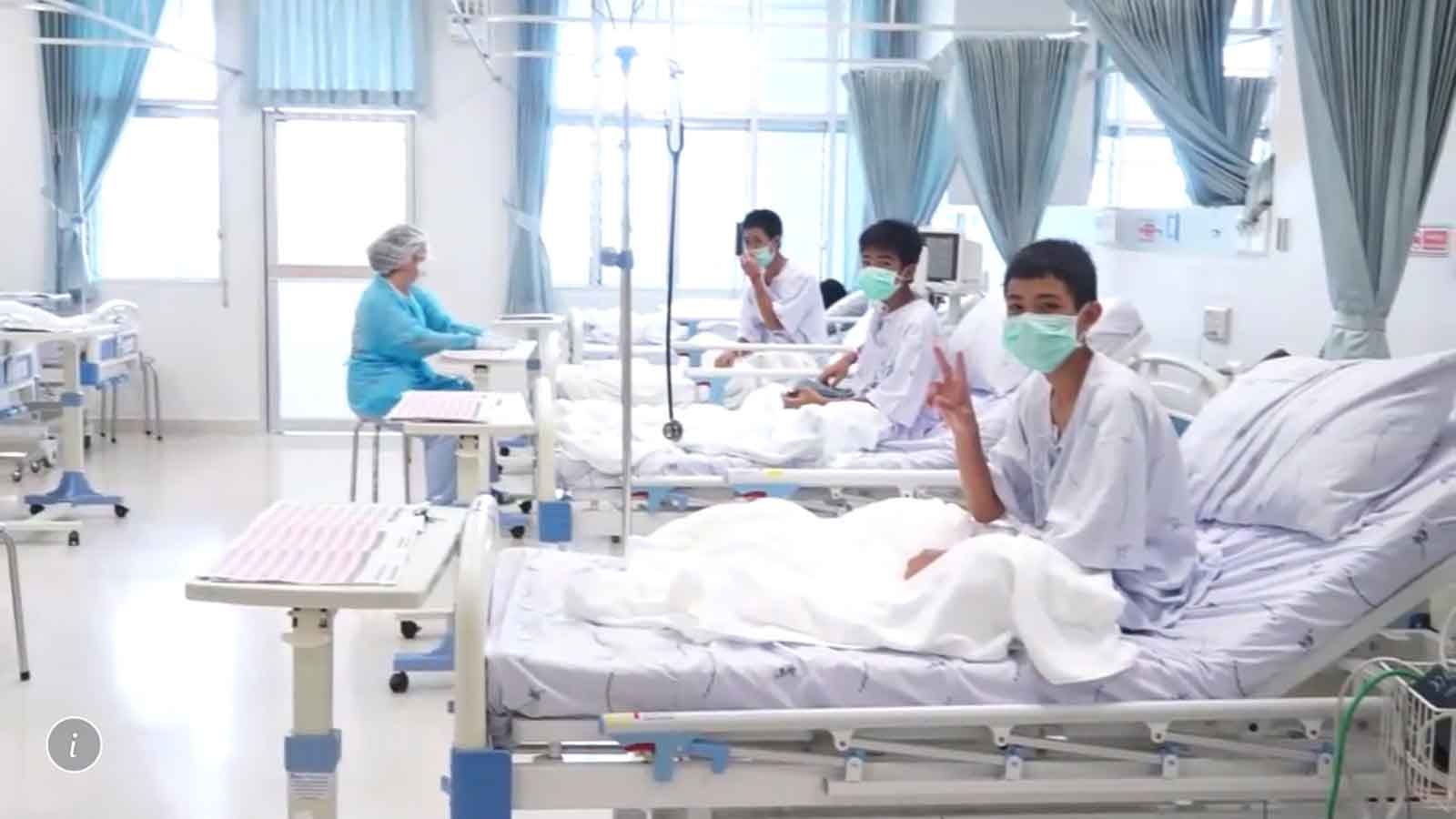  this image made from video, released by the Thailand Government Spokesman Bureau, three of the 12 boys are seen recovering in their hospital beds after being rescued along with their coach from a flooded cave in Mae Sai, Chiang Rai province, northern Thailand. (Thailand Government Spokesman Bureau via AP) 