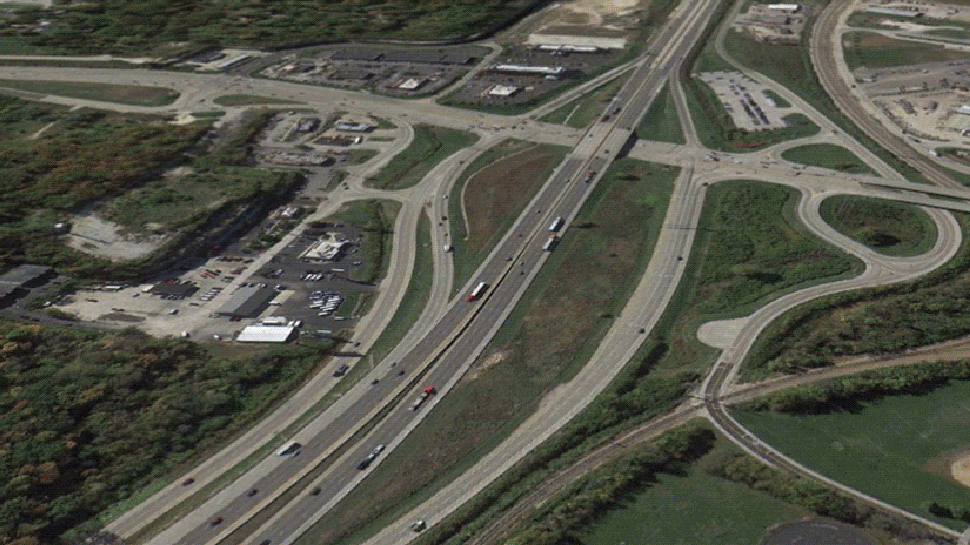 Before/after images of Interstate 44 flooded in Valley Park, Missouri, in December 2015.