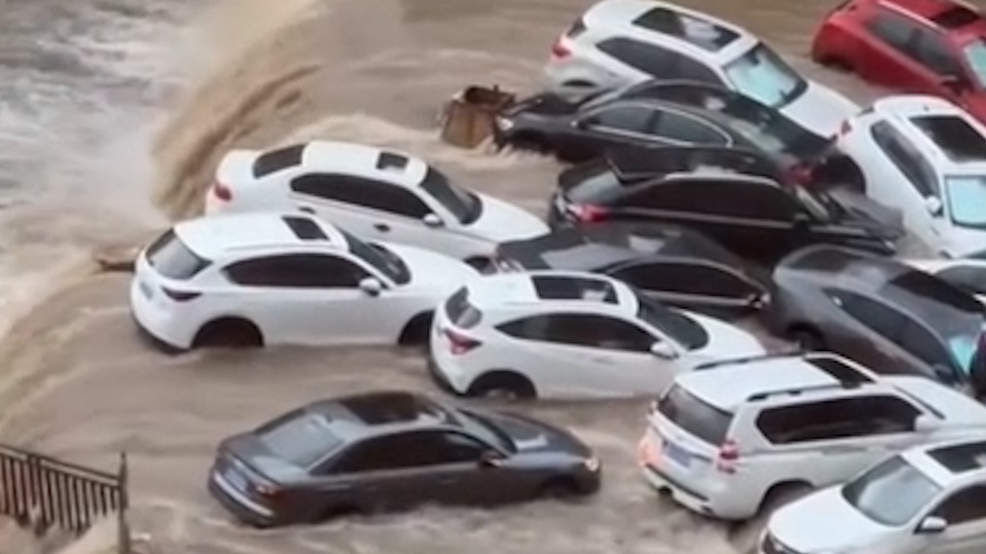 Dozens Of Cars Nearly Swept Over Waterfall
