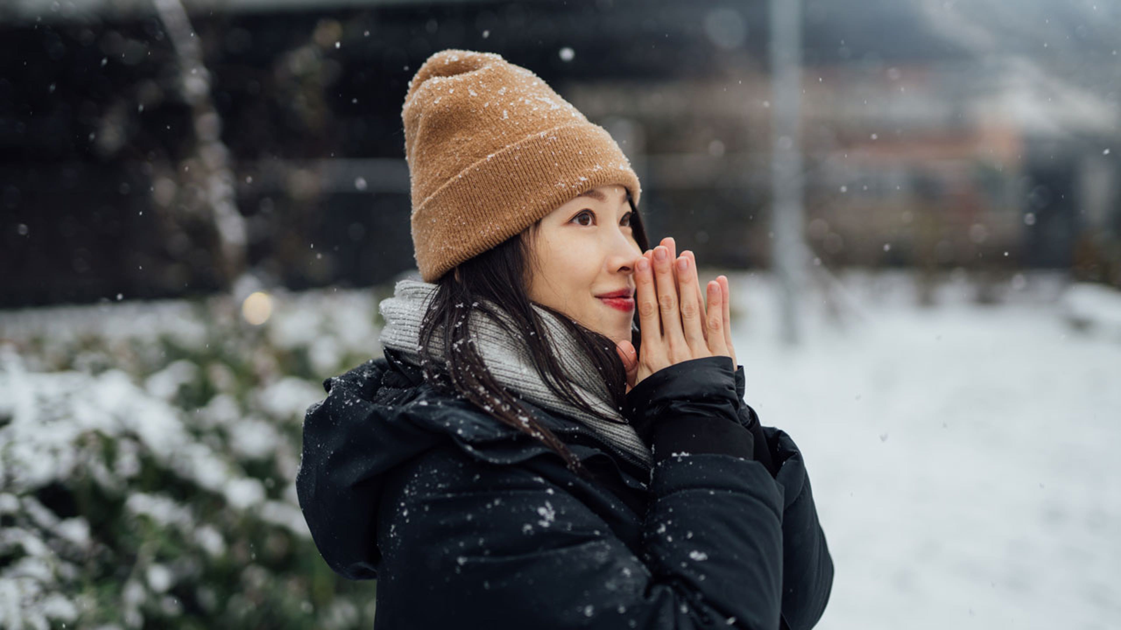 Woman in winter coat and hat