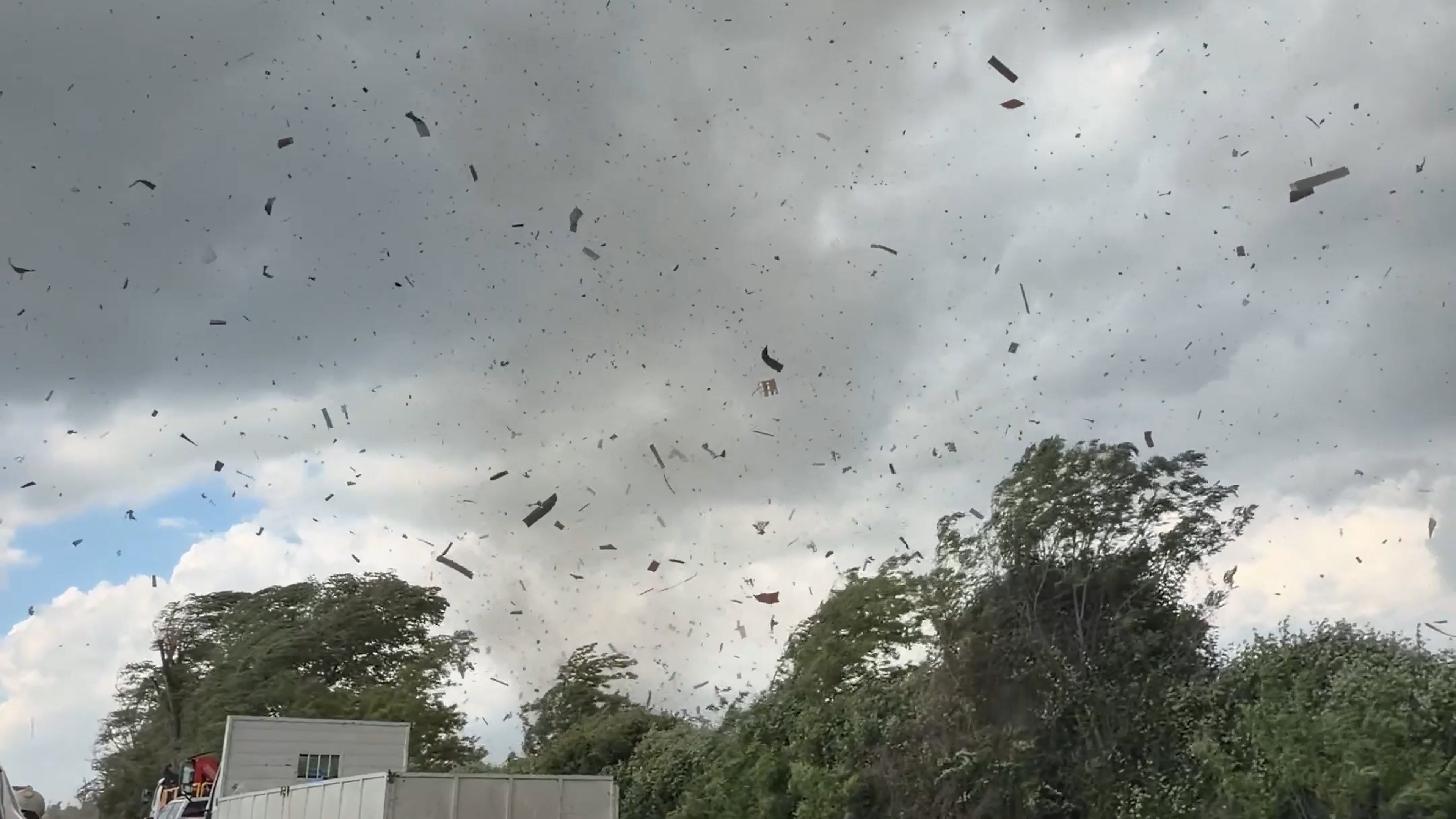 Tornado forms in front of drivers in Chile, sending them into reverse
