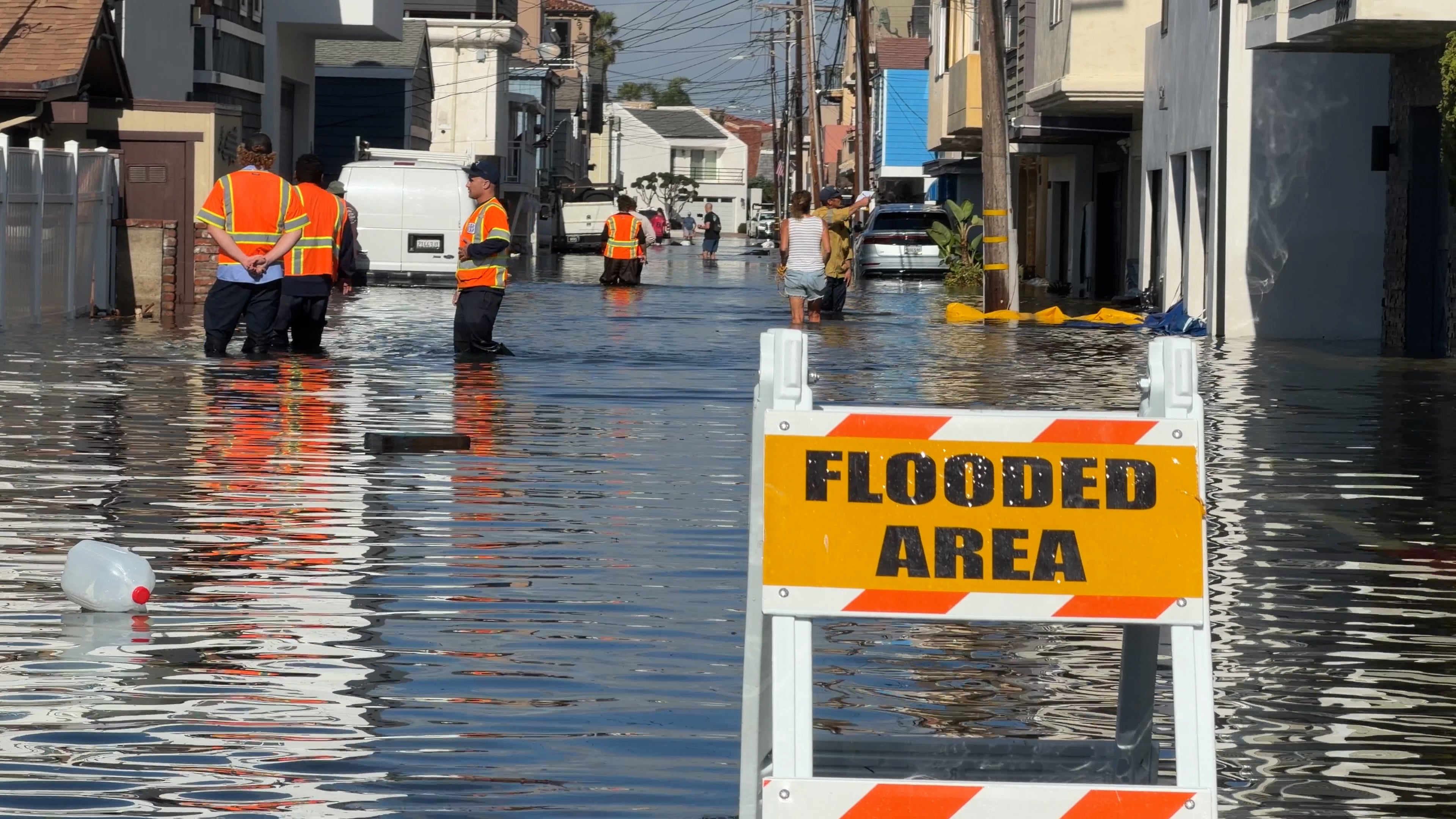 Coast-to-coast king tides have people grabbing kayaks and paddleboards