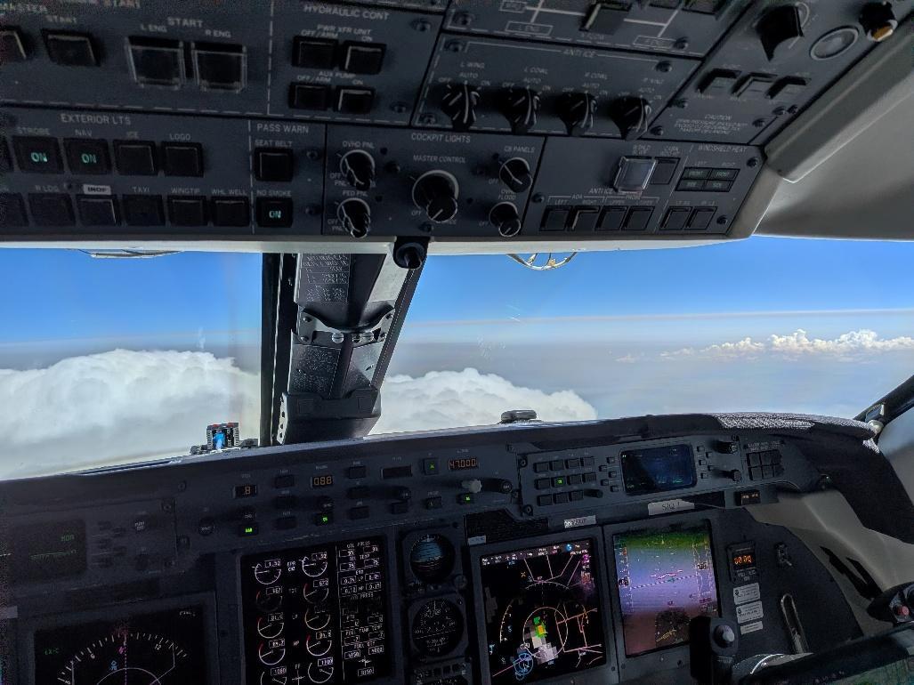 The cockpit of the National Science Foundation (NSF) National Center for Atmospheric Research (NCAR) GV aircraft overlooks a pyrocumulonimbus, or pyroCb, cloud during the Injected Smoke and PYRocumulonimbus Experiment (INSPYRE). 