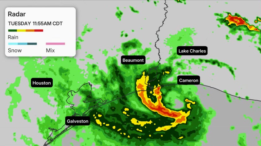 Weather radar map showing heavy rain bands over the Texas-Louisiana Gulf Coast, including Houston, Galveston, Beaumont, Lake Charles, and Cameron, dated Tuesday 11:55AM CDT.
