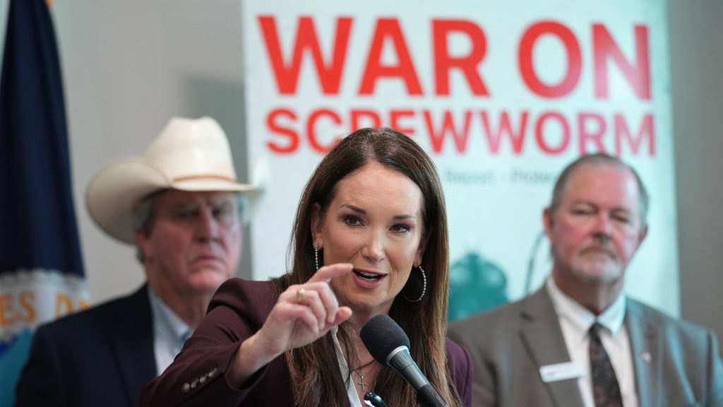 U.S. Agriculture Secretary Brooke Rollins, center, holds a news conference with ranchers, researchers and officials at the Knipling-Bushland U.S. Livestock Insects Research Laboratory in Kerrville, Texas, Monday, June 8, 2026. 