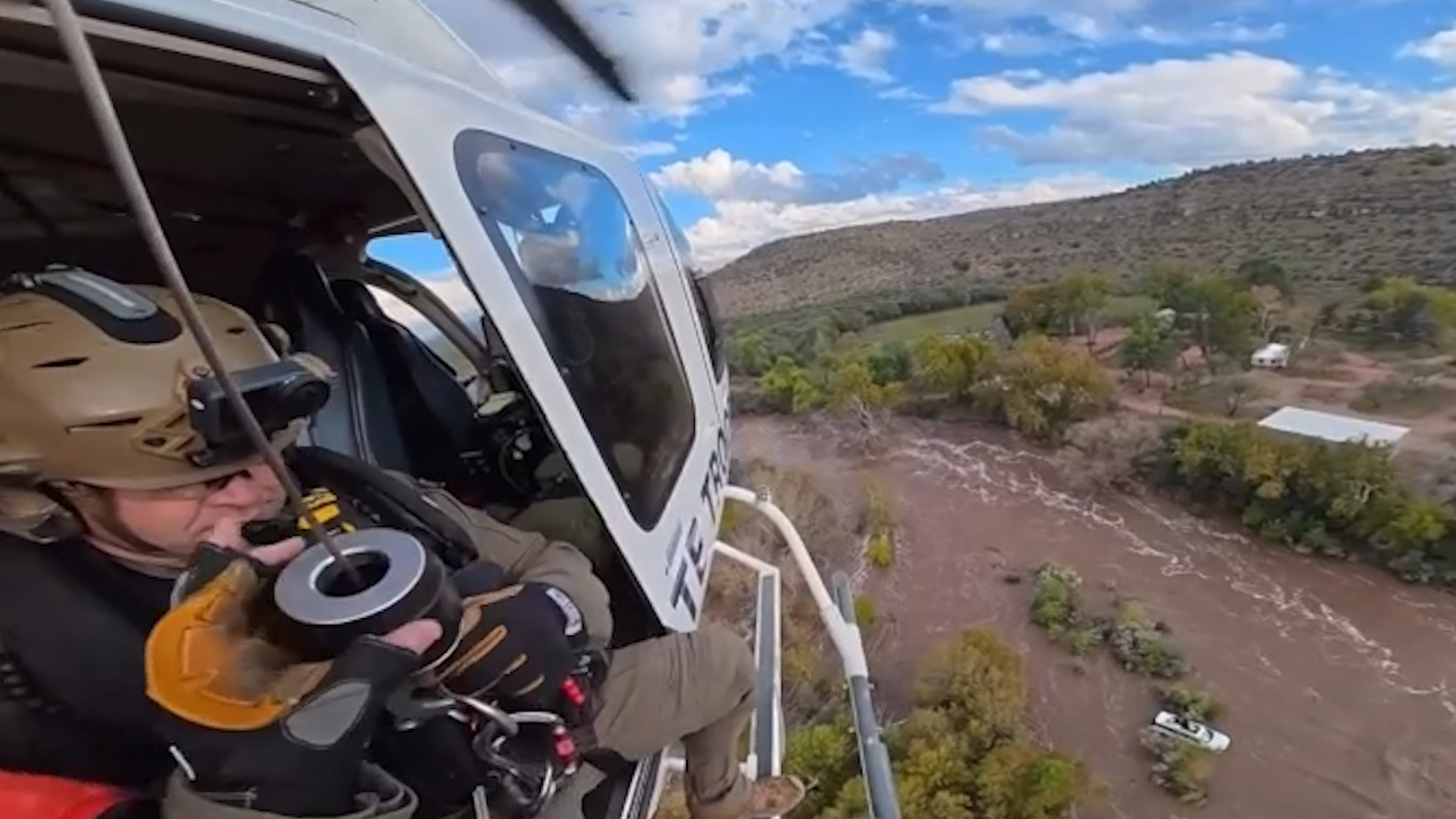 Helicopter crew rescues four from SUV caught in Arizona flash flooding