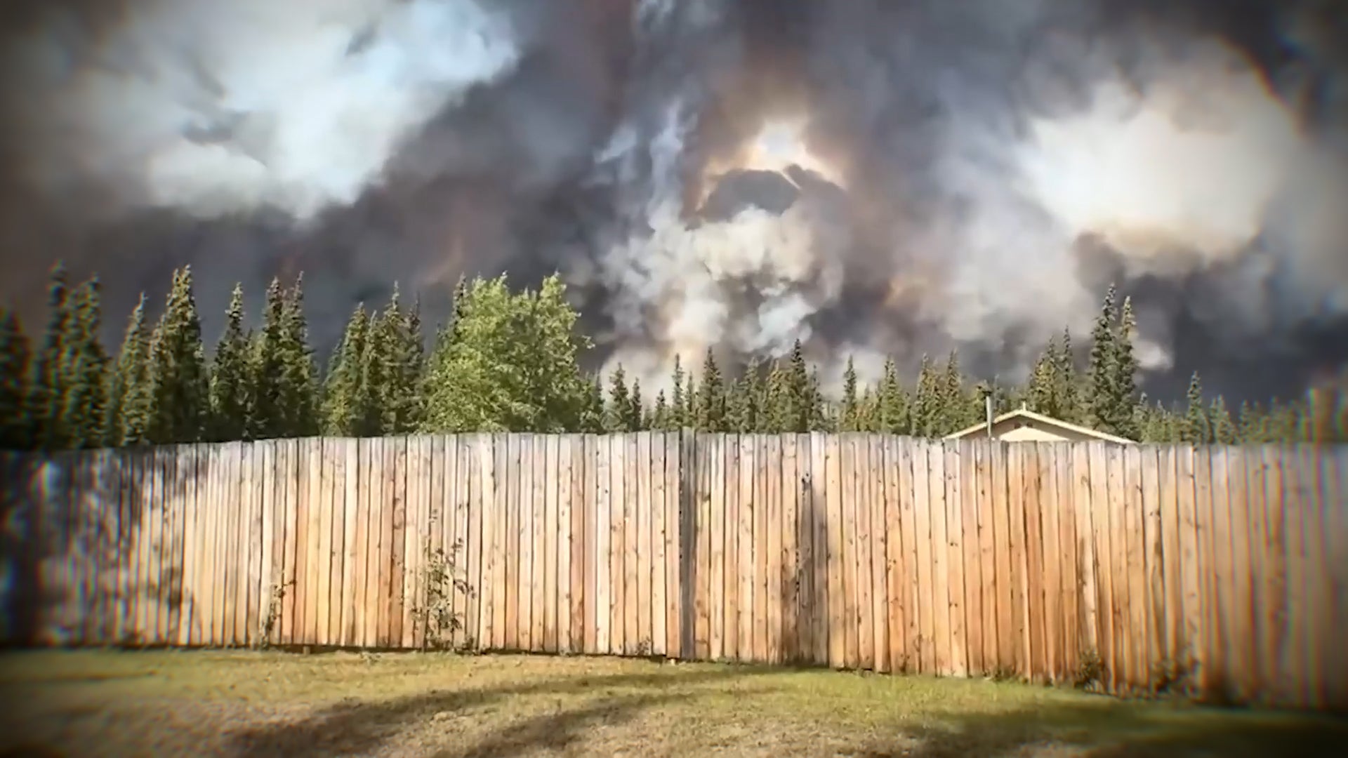 Alaska wildfire sparked by downed power line burns homes in Tok