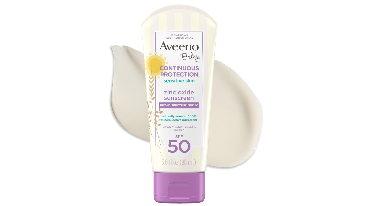 Aveeno Baby zinc oxide sunscreen tube with SPF 50 for sensitive skin, featuring purple cap and white squeeze bottle with cream swirl in background