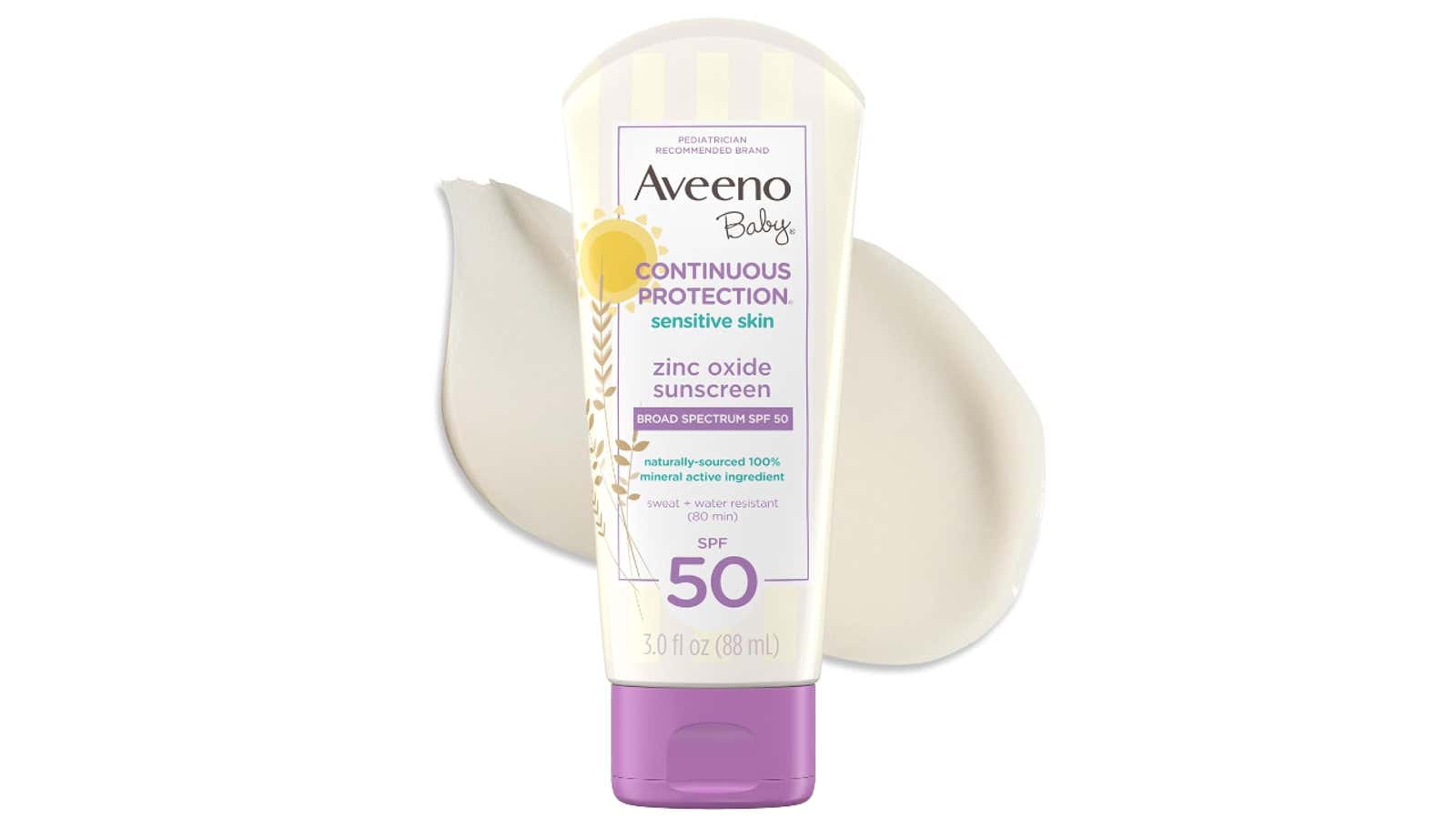 Aveeno Baby zinc oxide sunscreen tube with SPF 50 for sensitive skin, featuring purple cap and white squeeze bottle with cream swirl in background