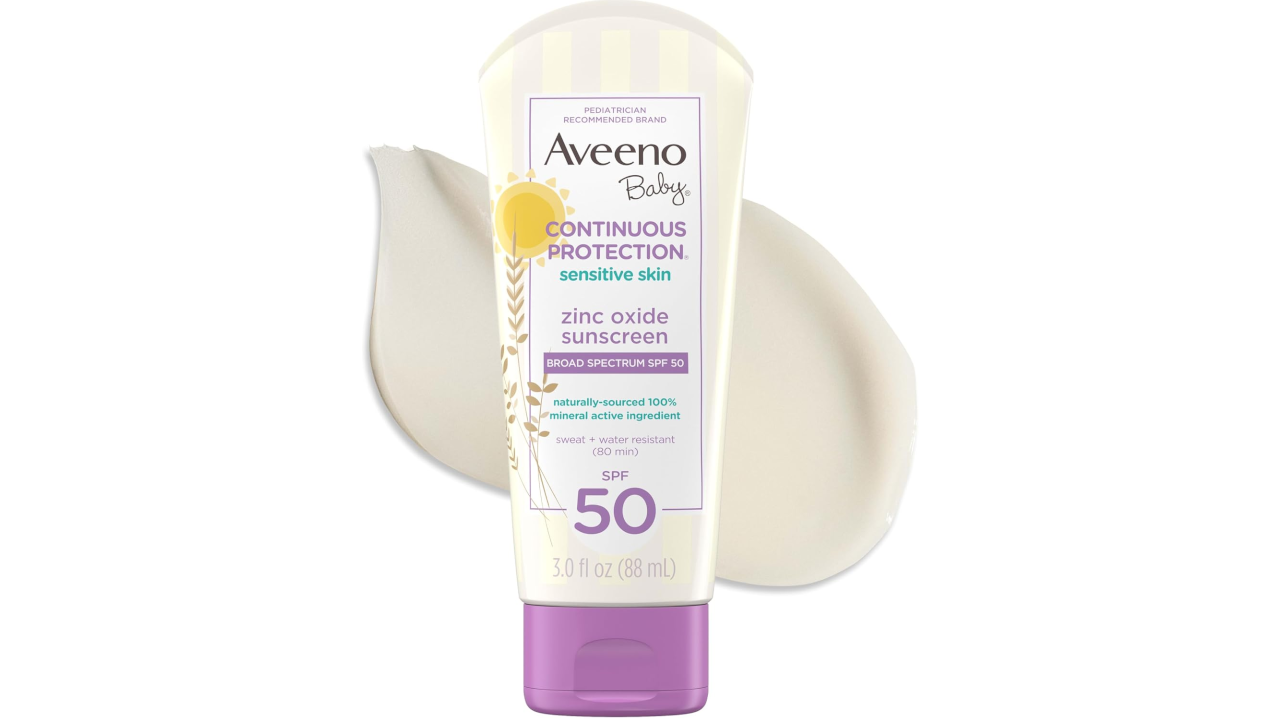 Aveeno Baby Continuous Protection zinc oxide sunscreen tube, SPF 50, 3.0 fl oz, with cream texture swatch behind it