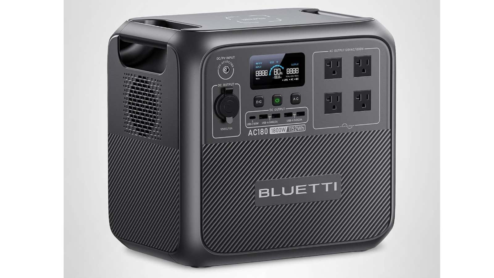 Black BLUETTI AC180 portable power station with LCD display, multiple AC outlets, and ventilation grilles