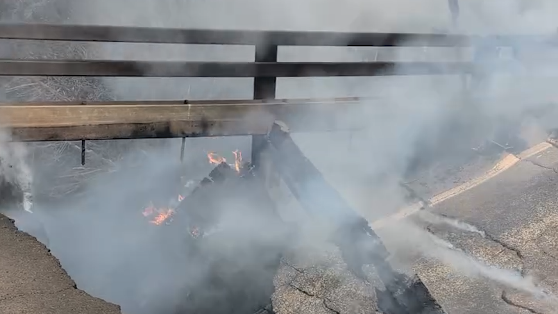 Wildfire burns bridge, cuts off fire trucks in Colorado