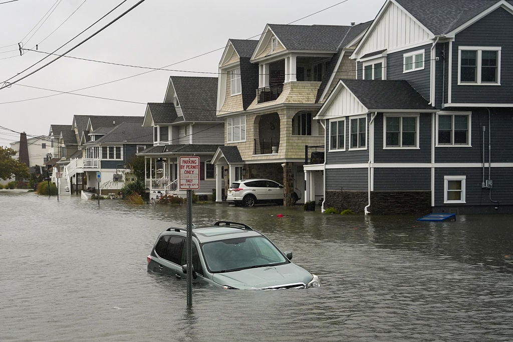 car submerged in floodwaters