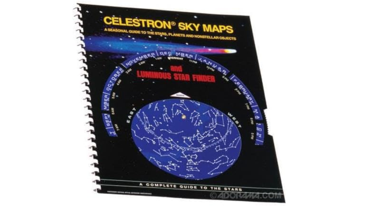 Cover of spiral-bound "Celestron Sky Maps" book with a luminous star finder wheel and constellation chart