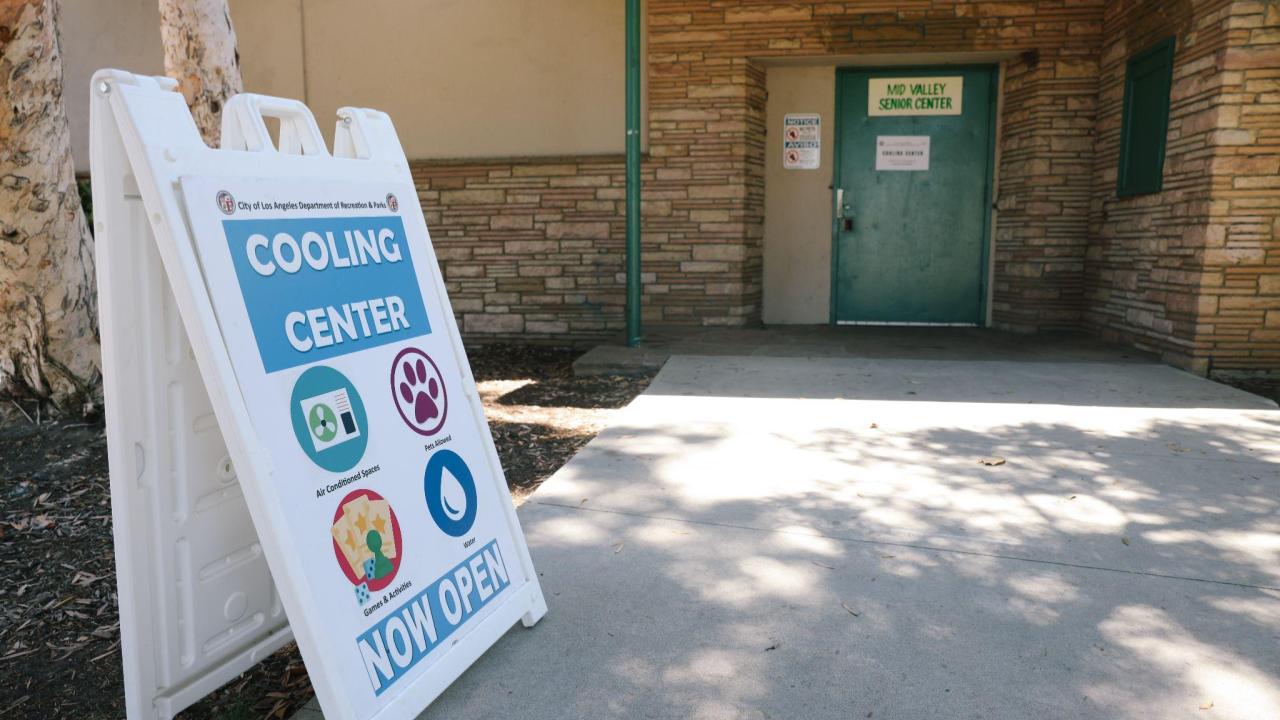 Signage directs people to an "augmented" cooling centers to help people escape the heat in what is expected to be an excessively hot Fourth of July weekend 