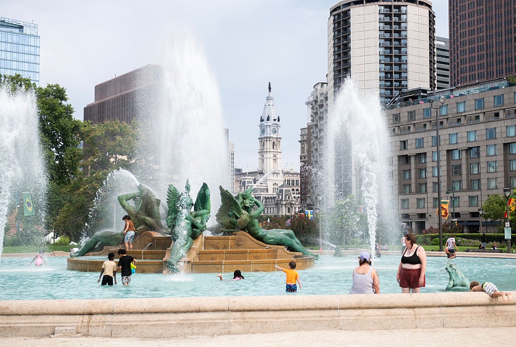 A heat dome sends families to a Center City fountain in Philadelphia, driving temperatures, and power demand, toward records. 