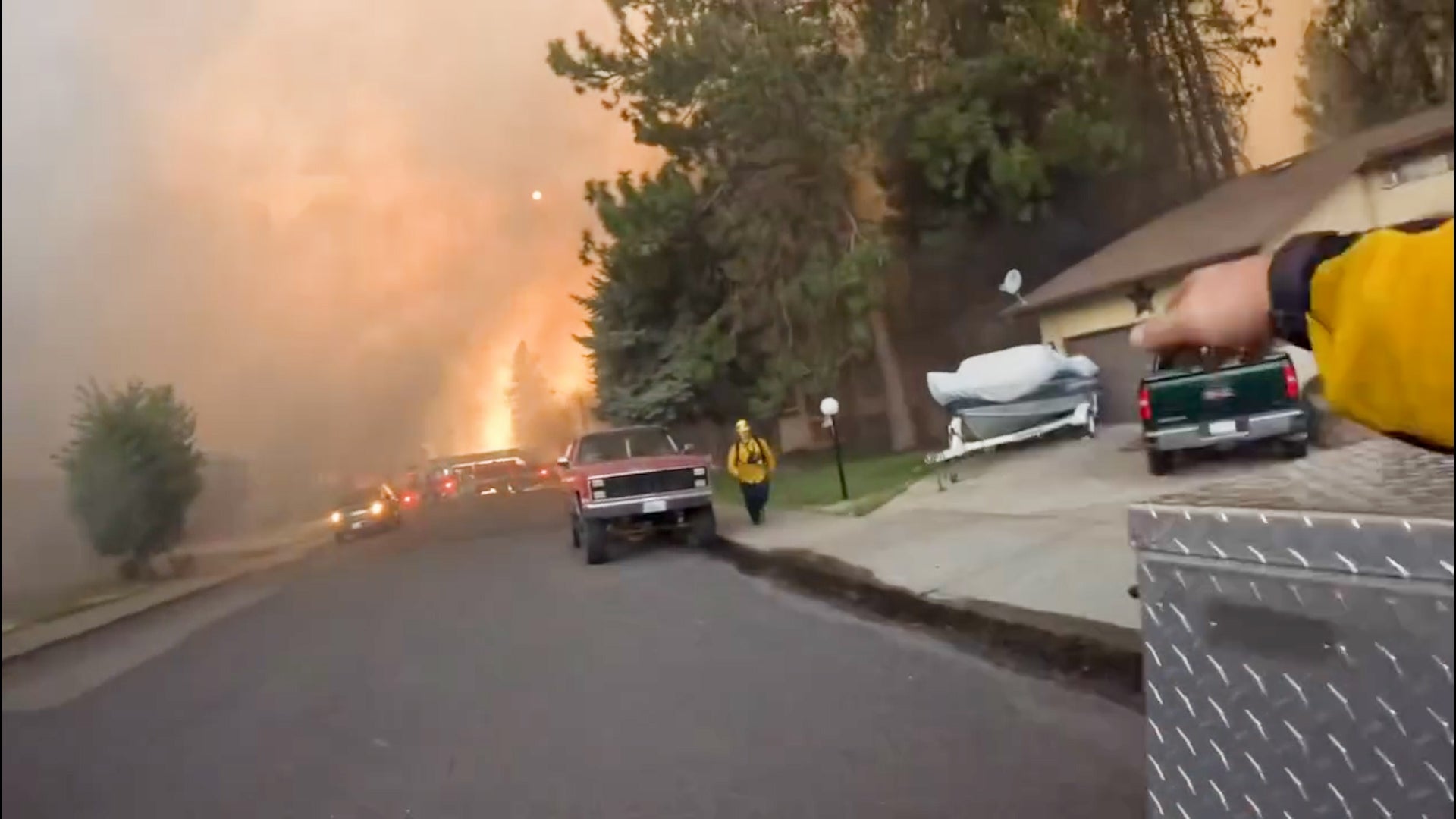 Firefighters race into danger as Spokane wildfires rage