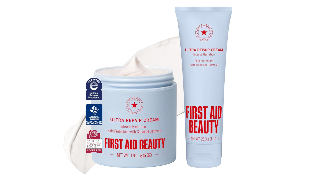 Two First Aid Beauty Ultra Repair Cream containers - a large jar and tube - with light blue packaging and red text, featuring certification badges