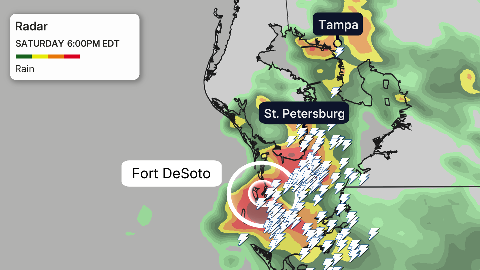 Weather radar map showing heavy rain and lightning near Tampa, St. Petersburg, and Fort DeSoto, Florida, Saturday 6:00PM EDT