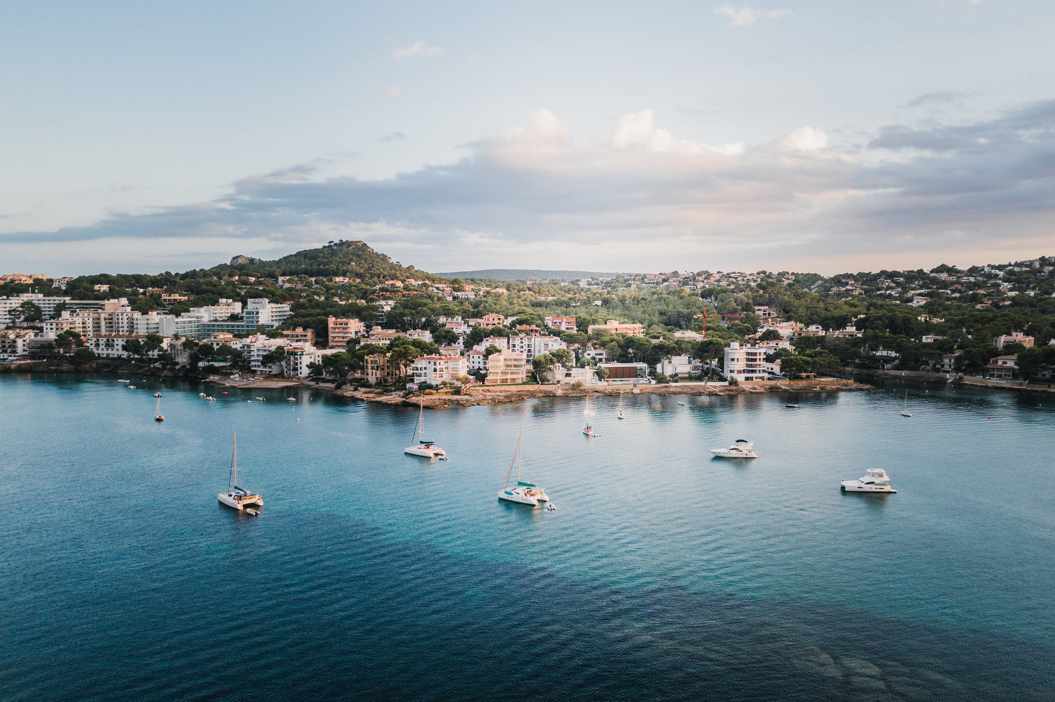 Aerial shot showing boats moored off the Santa Ponsa coastline, Majorca, Spain 