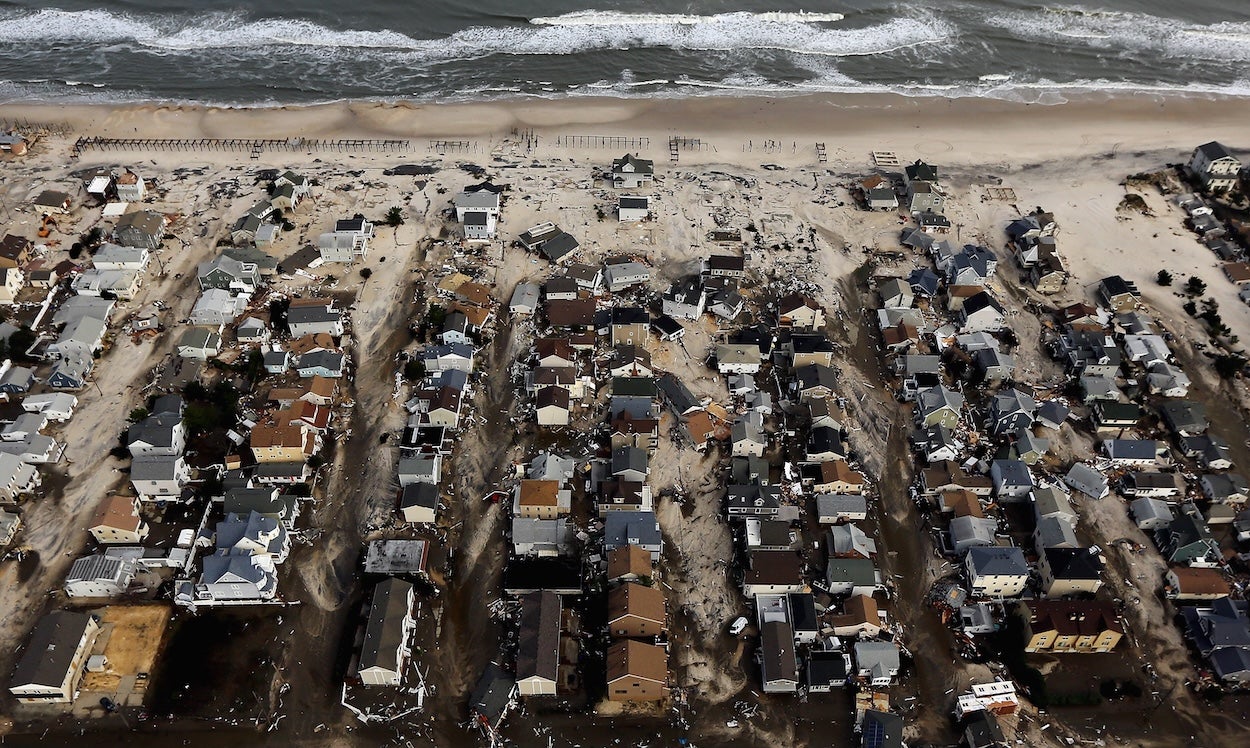Homes sit in ruin next to the Atlantic Ocean after being destroyed by Hurricane Sandy on October 31, 2012 in Seaside Heights, New Jersey. 